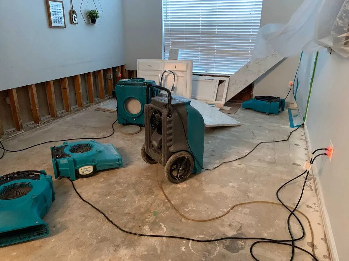 Dehumidifier in flood-cut room for Water Damage Restoration in Swanton